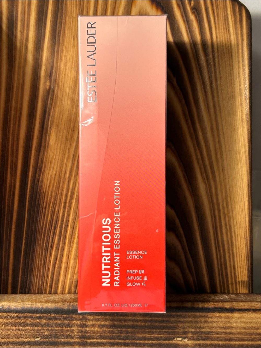 Estee Lauder Nutritious Radiant Essence Lotion - Coral Pink Gradient